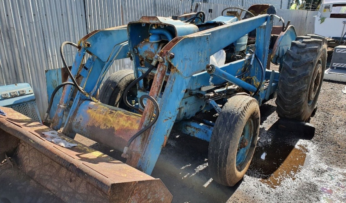 Front end loader being serviced at The Engine Bay